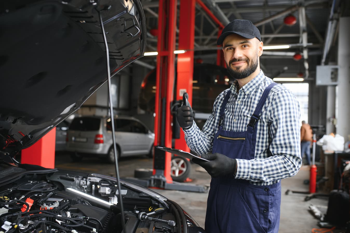 professional-caucasian-car-mechanic-with-checklist-2023-12-18-21-26-18-utc (1) https://rhinowebllc.com/bullock-auto-world/wp-content/uploads/2024/10/professional-caucasian-car-mechanic-with-checklist-2023-12-18-21-26-18-utc-1.jpg