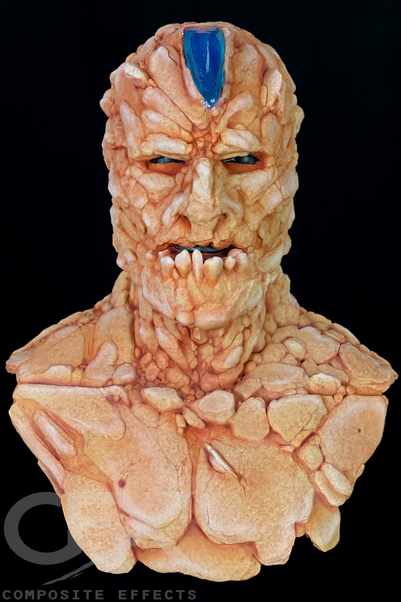 Golem-Sandstone-with-Turqoise-Gem-1.jpg