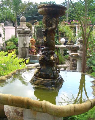 Cast stone cherub fountain