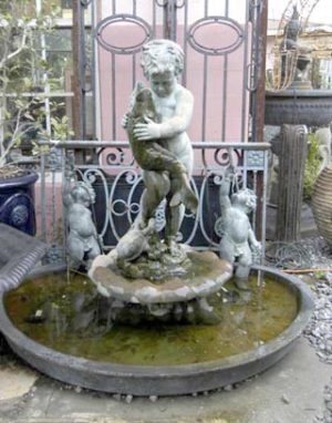 19th c bronze figure of putti holding a fish fountain