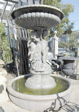 Neoclassical style cast stone garden fountain