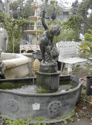 19th Putti holding fish fountain