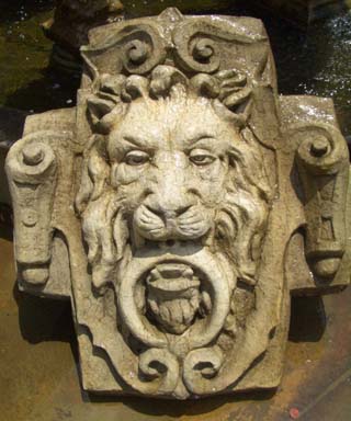 Cast stone recreation of a 19th century lion mask