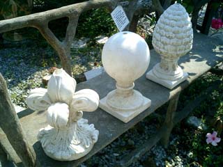 Assortment of cast stone fountain finials