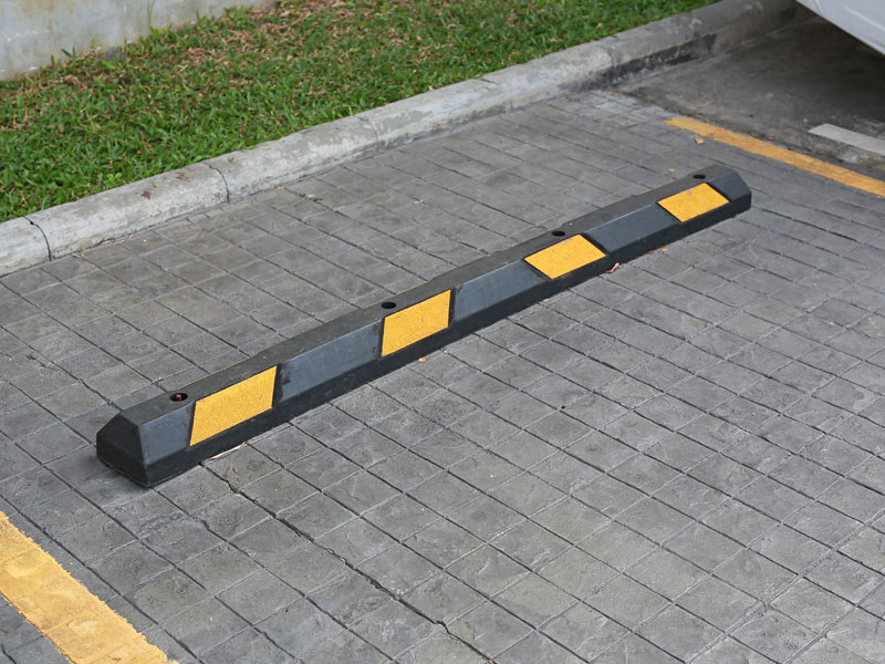 https://rhinowebllc.com/gulstriping/wp-content/uploads/2025/04/concrete-parking-bumper.jpg