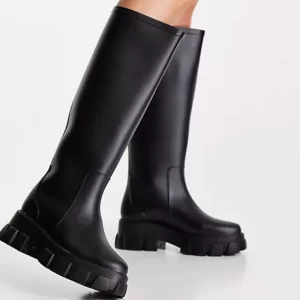 Black rubber knee boots