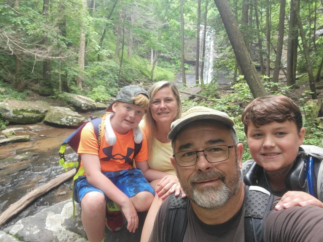 https://rhinowebllc.com/total-landscaping/wp-content/uploads/2025/06/about-us-family-img.jpg